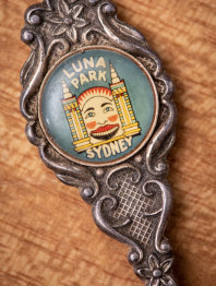 Detail of an antique souvenir Luna Park teaspoon in Nicole Bretts collection.