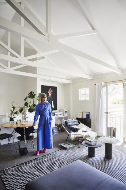 A high vaulted ceiling and Chelsea’s choice of a monochromatic colour palette create a striking open-plan living, kitchen and dining space.