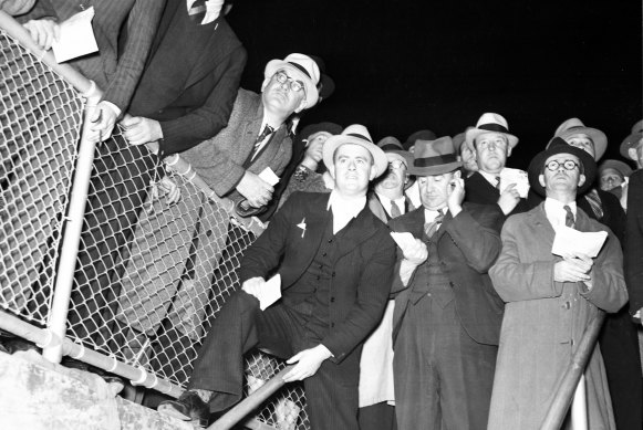 Punters watch the action at a meeting at Harold Park dogs in Sydney on 2 September 1938.