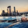 Ava Penklis enjoys the rooftop pool at the Emporium Hotel overlooking the Brisbane CBD.