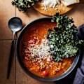 Take this comforting tomato and lentil soup to the next level with kale and parmesan crisps.