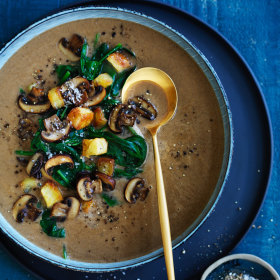Adam Liaw’s mushroom soup topped with extra mushrooms and spinach.