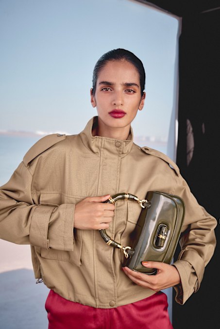 Zara cropped trench jacket, $139. Viktoria & Woods “Deluxe” pants, $390. Gucci “Bamboo Diva” bag, $7650.