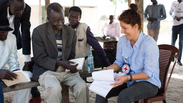 Dorsa meets William Khor Reth, commissioner of the village of Motot, to authorise the reopening of a Red Cross health unit in the village that was closed by fighting.