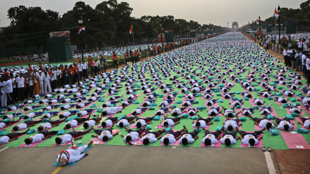 Prime Minister Narendra Modi leads thousands of Indians in a yoga celebration. 