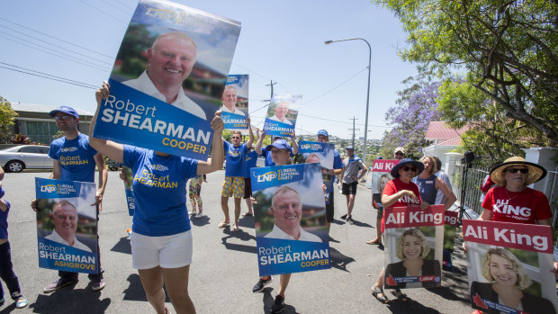 LNP and Labor supporters were on hand to watch the Premier arrive at Government House.