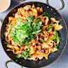 Crispy chilli oil adds its ineffable charm to this peanutty pork and noodle stir-fry.