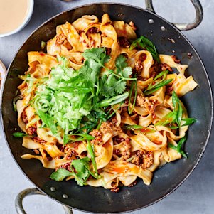 Crispy chilli oil adds its ineffable charm to this peanutty pork and noodle stir-fry.