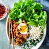 Korean beef and green rice bowl with soft-boiled eggs.