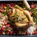 Tomato, bean and chicken tray bake with mint pesto.