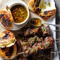 Picanha beef skewers with cheese-stuffed flatbreads.