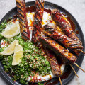 Barbecued cevapi skewers with herb and quinoa tabbouleh.