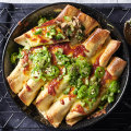 Spicy coriander and pork frying pan enchiladas