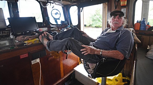 Cairns-based fisherman Bruce Batch, aboard his boat "Sydney Lewis", wants to see more detail of the government's marine park plan before giving his tick of approval.
