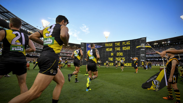 Roaring back:  The Tigers take to the field for round one of season 2018.