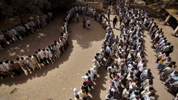 Unemployed Indians line up for a government job in Uttar Pradesh.