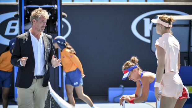 Globetrotting Australian tennis umpire John Blom officiates at an Australian Open doubles match on Tuesday.