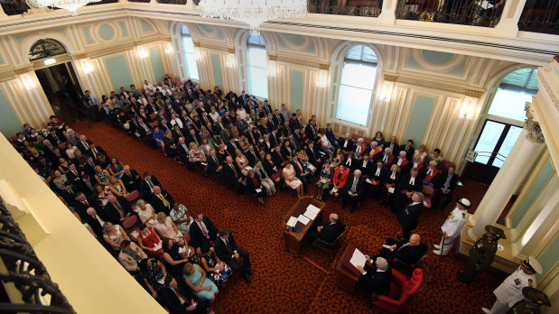 Queensland Governor Paul de Jersey addressings members and their guests in the old upper house.