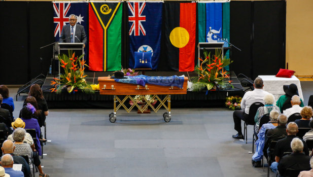 Pastor Uncle Brian Lampton conducts the state funeral of Dr Evelyn Scott at Townsville Stadium.