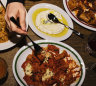 Rigatoni arrabbiata comes with wood-fired chilli, stracciatella and olive.