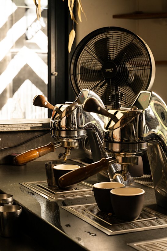 Baristas making coffees at Single O. 