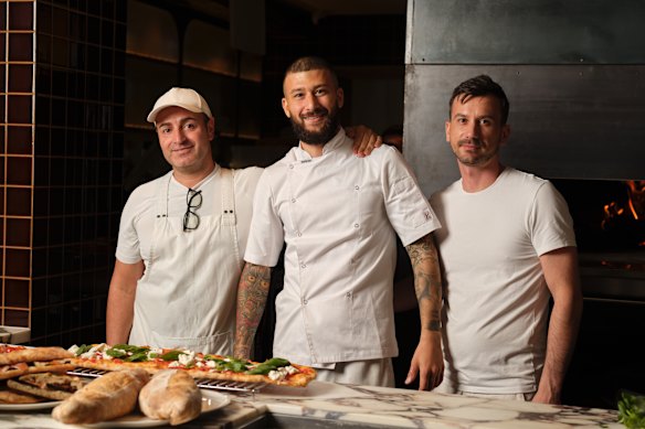 Pizza chefs Daniele D’Andrea and Lucas Moret  with head pizza chef Alessandro Penna (centre). 