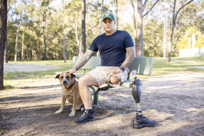 Brennan Smith with his dog Archie near his house in Brisbane last year.