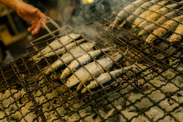Portugal’s famed export, sardines, here grilled over coals. 