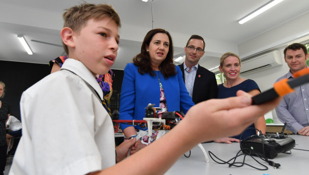 Queensland Premier Annastacia Palaszczuk (centre) is seen at Everton Park State High School during the Queensland election campaign.