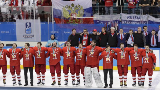 In full song: Players defied a ban on singing the Russian national anthem at the awards ceremony.