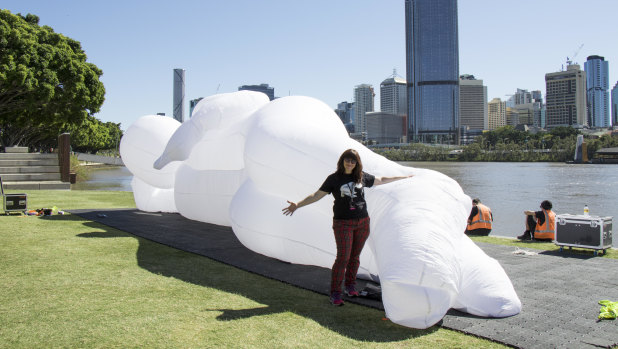 Artist Amanda Parer with one of her creations.