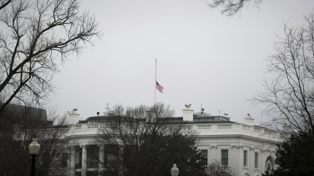 The United States flag at half mast.