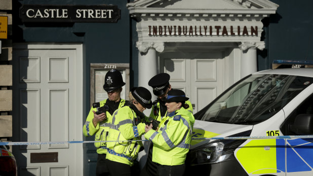 British police guard a restaurant in Salisbury, near to where Sergei Skripal was found critically ill. 