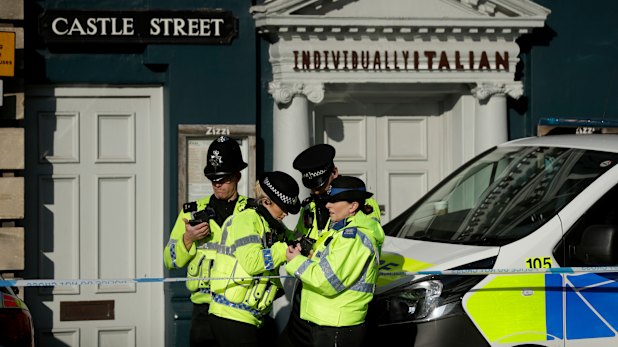 British police guard a restaurant in Salisbury, near to where Sergei Skripal was found critically ill. 