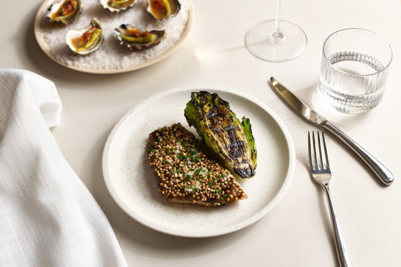 Wood-fired sugarloaf cabbage with biquinho peppers and fried garlic; and plambadoi oysters with ’nduja and guindillas.