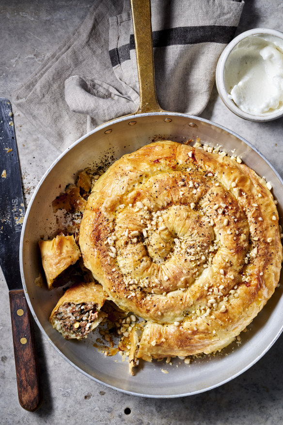 Serve this lamb, rice and vine leaf borek with garlic dip.