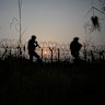 Indian soldiers patrol along the highly militarised Line of Control that divides Kashmir region between India and Pakistan.