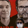A worker of the National Indian Foundation, FUNAI, stands next to a banner with images of missing Indigenous expert Bruno Pereira, right, and freelance British journalist Dom Phillips, during a vigil in Brasilia, Brazil, on Monday.