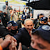 Israeli Prime Minister Benjamin Netanyahu greets supporters at a Tel Aviv market.