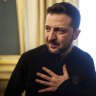 Ukrainian President Volodymyr Zelenskyy speaks to journalists during a press conference in Kyiv.
