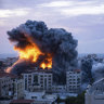Fire and smoke rises following an Israeli airstrike, in Gaza City.