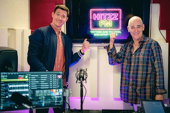 Ed Kavalee, left, with Working Dog’s Rob Sitch. The pair play FM radio hosts in the film.