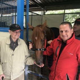 Unlikely Slipper: Neville and Grahame Begg with Written By in his box at Randwick.