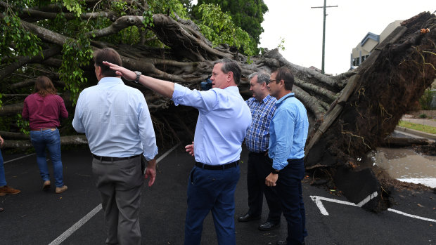 Queensland opposition leader Tim Nicholls checks out the damage caused in the Bundaberg storm.