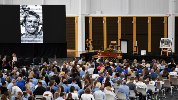 Mourners attend the memorial service for Dean Mercer on the Gold Coast.