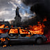 A car set ablaze in Paris.