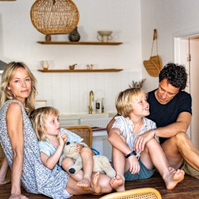 The couple, now based in Byron Bay, with their sons, Atlas and Finn.
