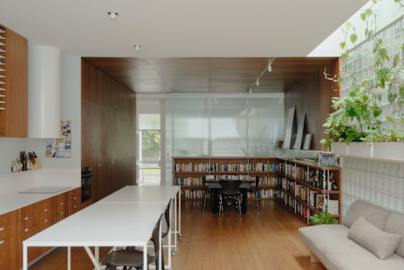 A warren of rooms, including the kitchen, dining room and lean-tos, at the back were replaced with one large generous open-plan kitchen and living area.