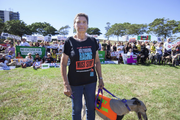 Lorraine Ramsay with rescue greyhound Sandy at the Anti-Greyhound Racing Rally at Sydney Park, St Peters on Saturday.