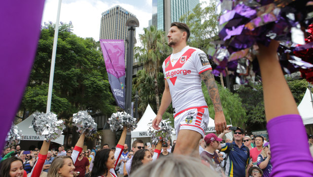 Main man: Gareth Widdop heads to the dais as the teams are feted.